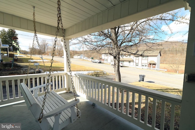 wooden deck featuring a porch