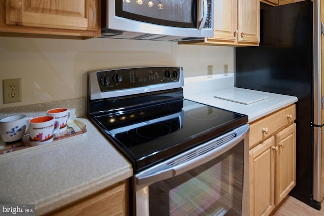 kitchen featuring appliances with stainless steel finishes