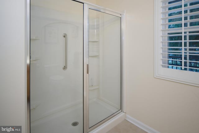 bathroom with an enclosed shower