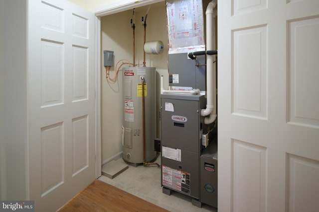 utility room with water heater