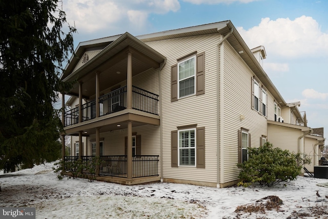 view of front of property with a balcony