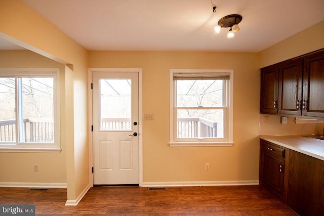 interior space featuring dark wood-type flooring