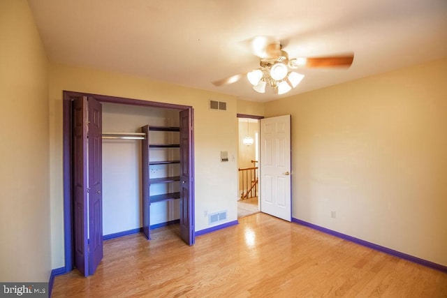 unfurnished bedroom featuring a closet, ceiling fan, and light hardwood / wood-style flooring