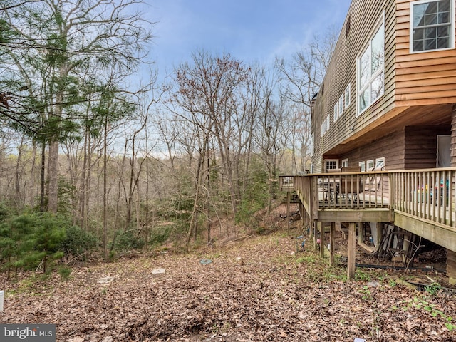 view of yard with a deck