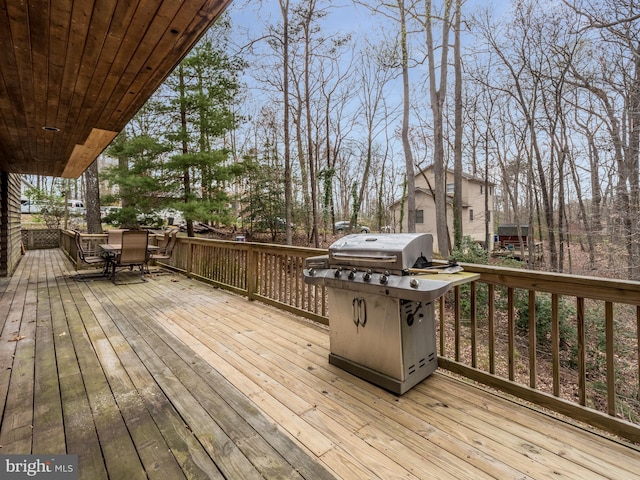 deck featuring a grill