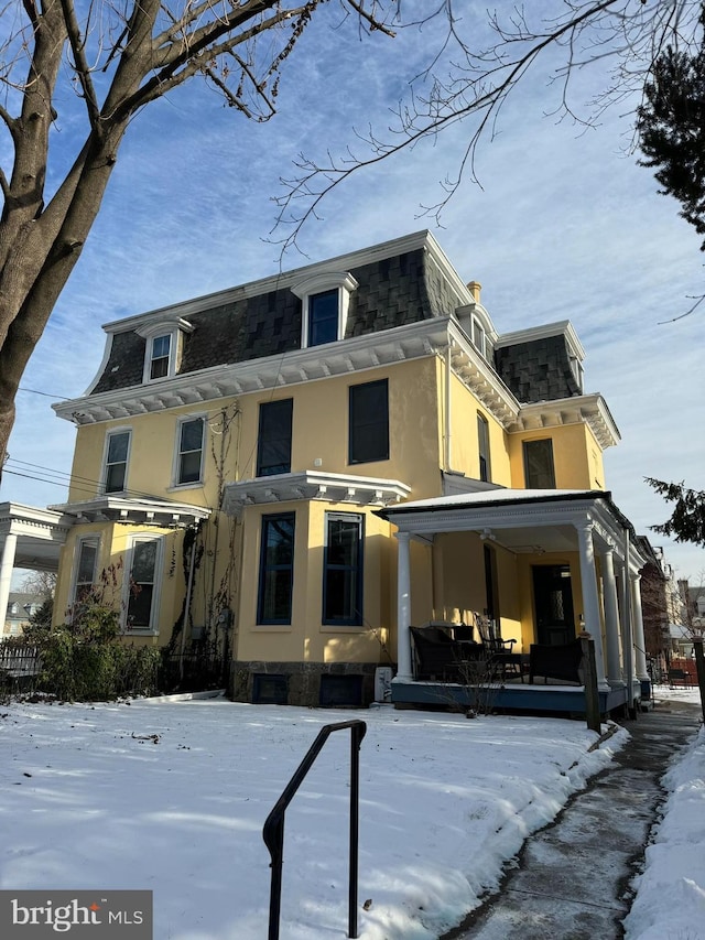 view of snow covered property