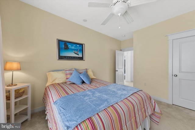 bedroom featuring baseboards, carpet, and a ceiling fan