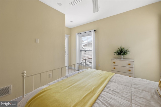 bedroom with visible vents and ceiling fan