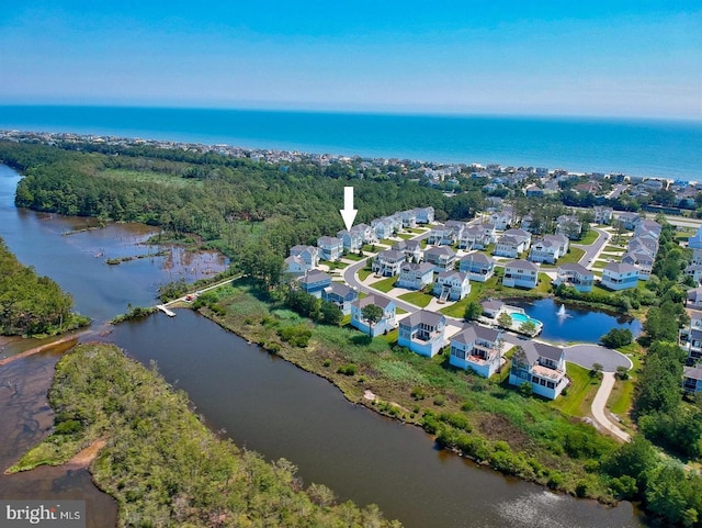 aerial view featuring a residential view and a water view