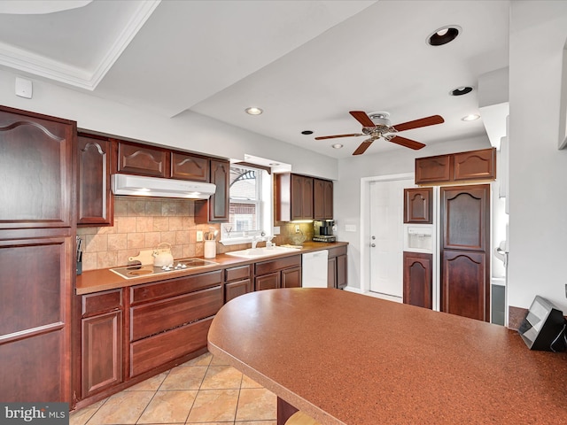 kitchen with light tile patterned flooring, sink, stovetop, dishwasher, and decorative backsplash