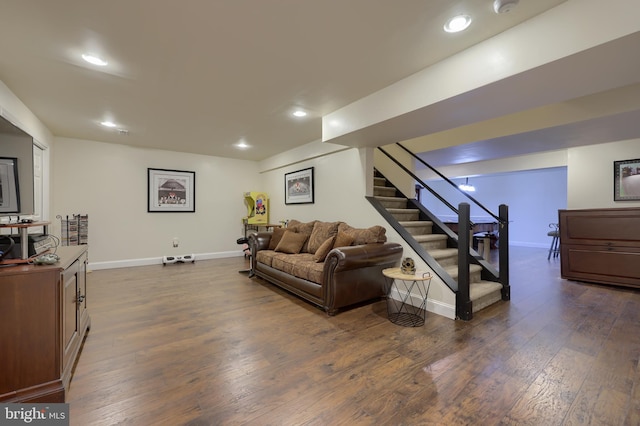 living area with dark wood-style floors, recessed lighting, stairway, and baseboards