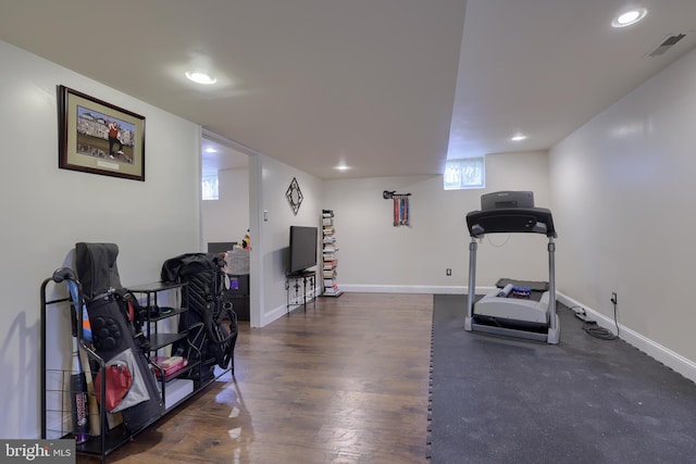 exercise room featuring recessed lighting, visible vents, baseboards, and wood finished floors