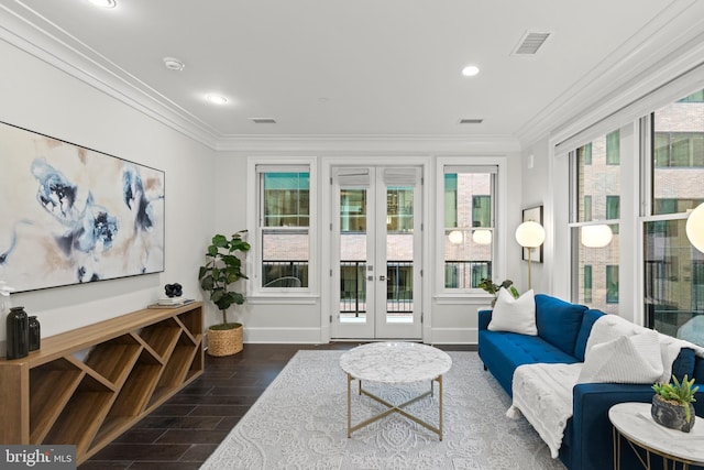 interior space featuring ornamental molding, french doors, visible vents, and baseboards