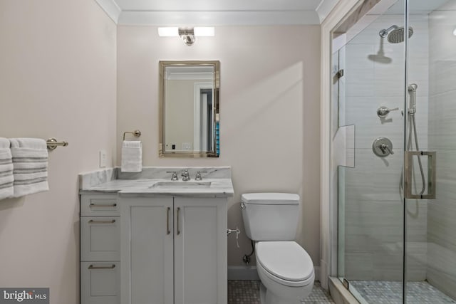 full bath featuring a stall shower, toilet, and crown molding