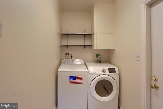 clothes washing area featuring washing machine and dryer