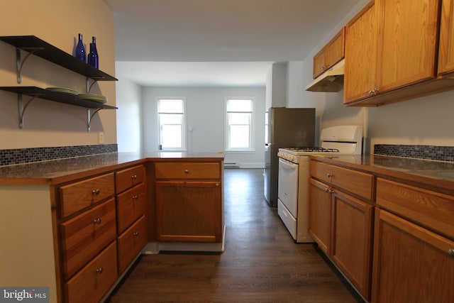 kitchen featuring open shelves, dark countertops, white gas range oven, and under cabinet range hood