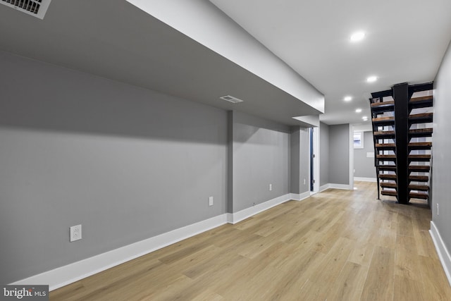 basement with light wood-type flooring