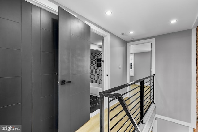 hallway featuring light hardwood / wood-style flooring