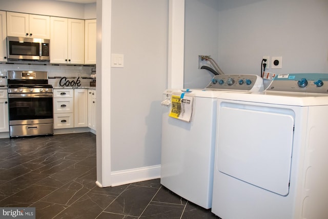 washroom featuring separate washer and dryer