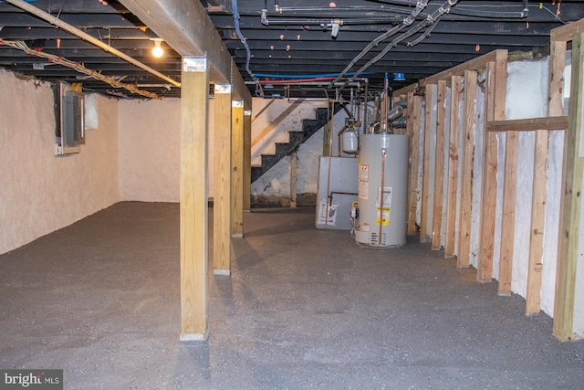 basement with gas water heater and electric panel