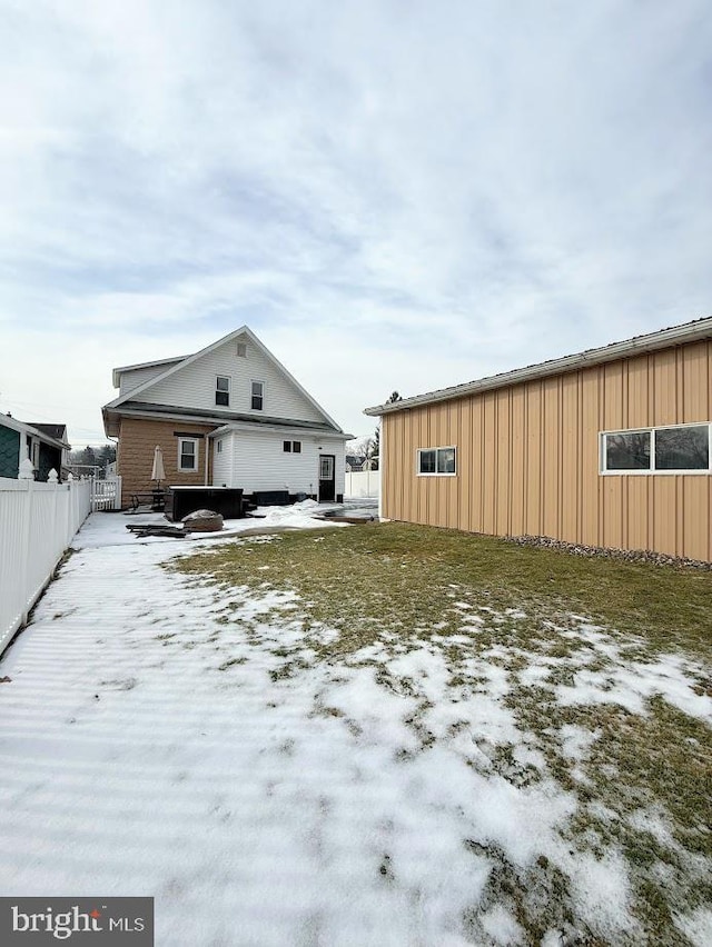 view of snow covered property