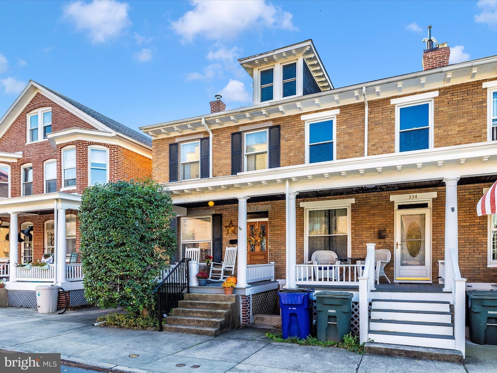 multi unit property featuring covered porch