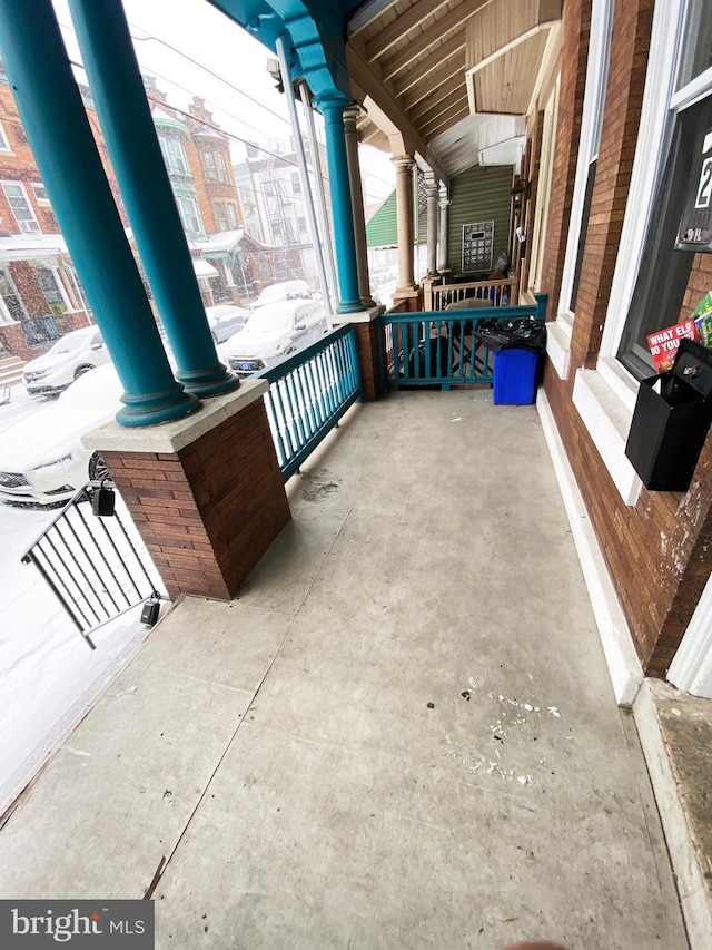 view of patio featuring a porch