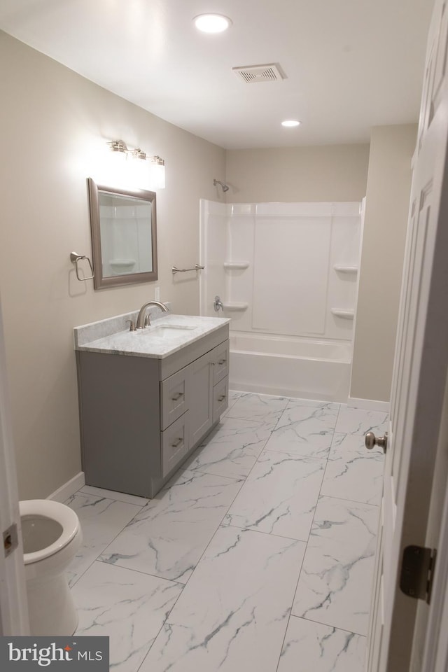 full bathroom with vanity, toilet, and shower / bath combination