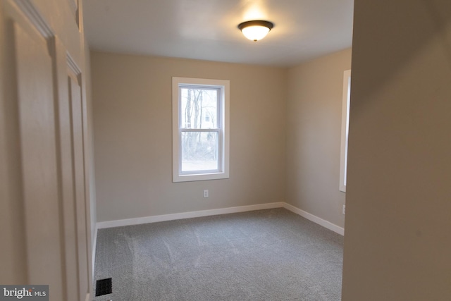 empty room with carpet floors