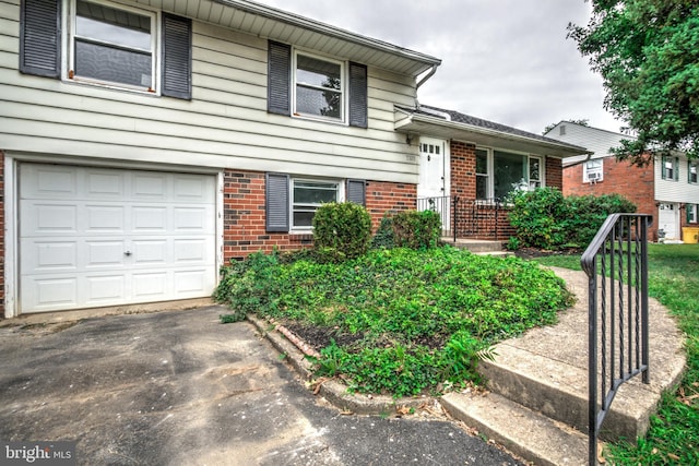 split level home with a garage