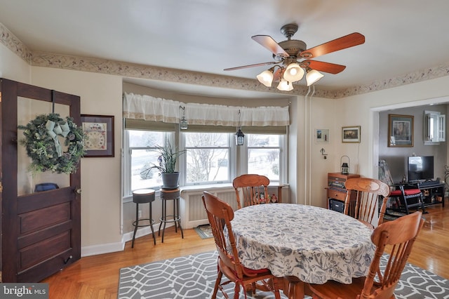 dining area with ceiling fan