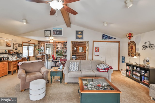 carpeted living room featuring lofted ceiling with beams and ceiling fan