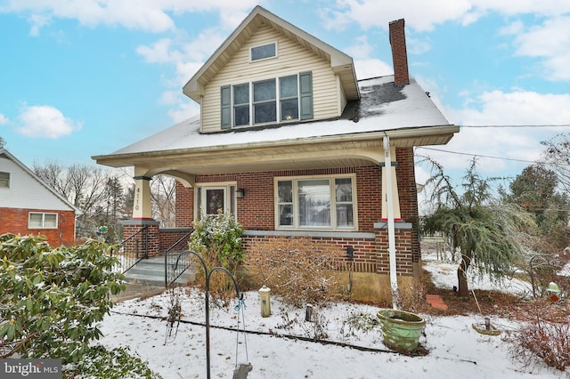 bungalow-style home featuring a porch