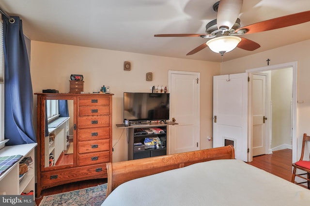 bedroom featuring ceiling fan and wood-type flooring