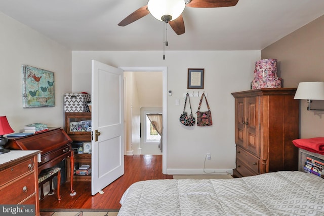 bedroom with wood-type flooring and ceiling fan