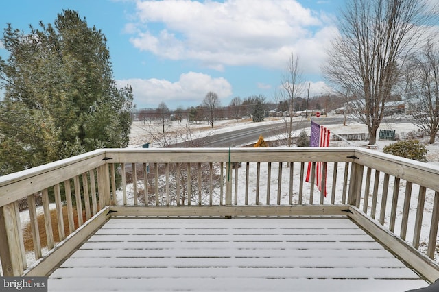 view of snow covered deck