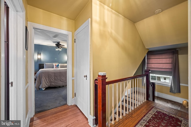 hallway featuring hardwood / wood-style flooring