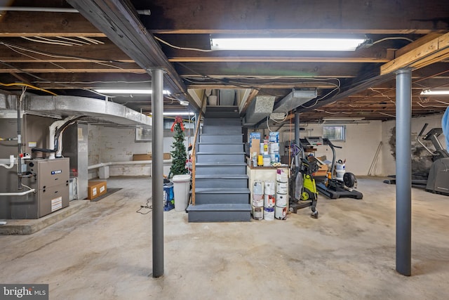 basement featuring heating unit