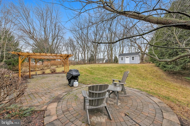 view of patio / terrace featuring an outbuilding, grilling area, and a pergola