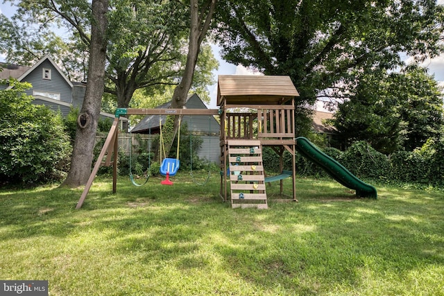 view of play area featuring a lawn