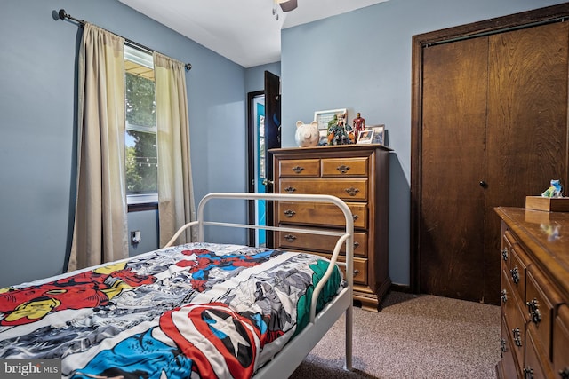 bedroom featuring carpet flooring and ceiling fan