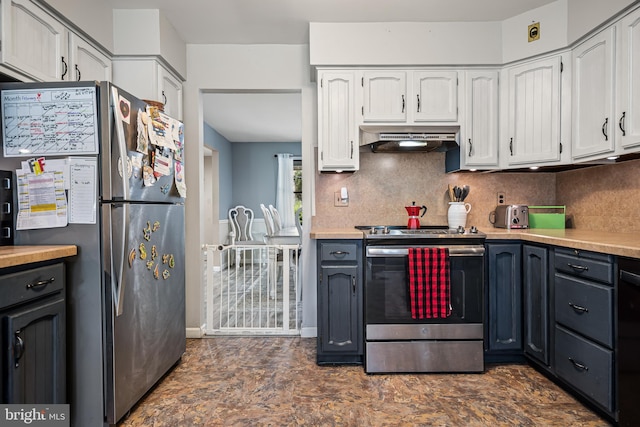 kitchen with white cabinetry, stainless steel appliances, and tasteful backsplash