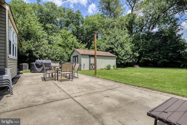 view of patio featuring cooling unit and a storage unit