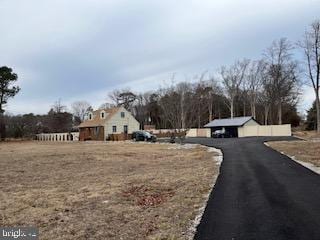 view of road featuring aphalt driveway