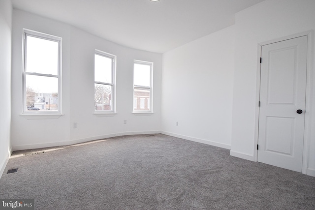 view of carpeted spare room