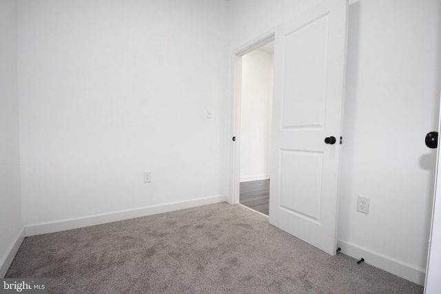 unfurnished bedroom featuring carpet