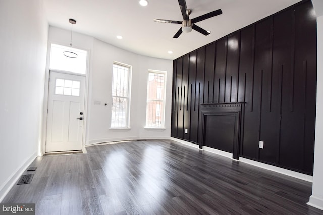 entrance foyer featuring hardwood / wood-style floors and ceiling fan