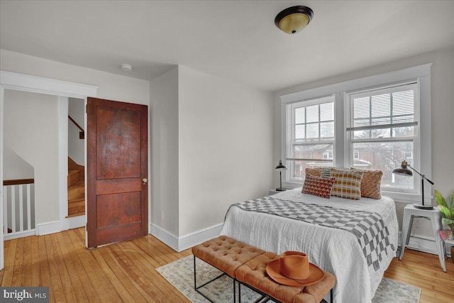 bedroom with light wood-type flooring