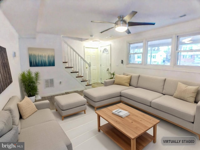 living room with ceiling fan