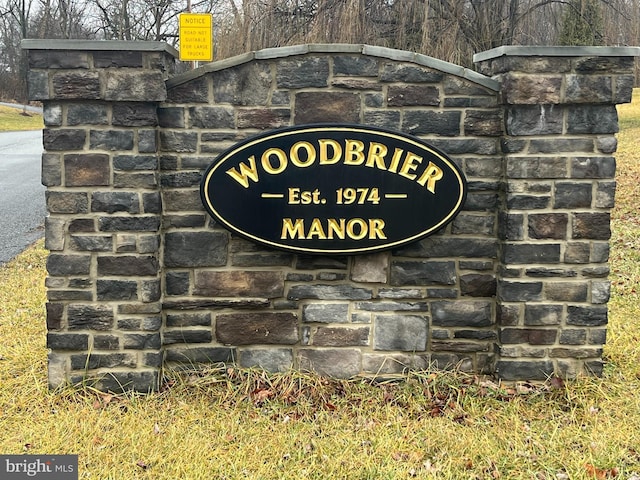 view of community sign